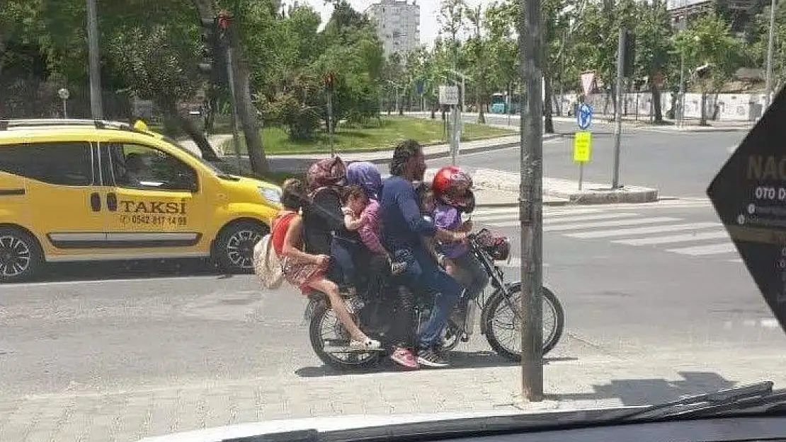 '7 kişi bir motosiklette'