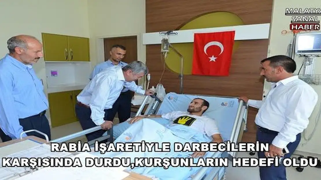 RABİA İŞARETİYLE DARBECİLERİN KARŞISINDA DURDU, KURŞUNLARIN HEDEFİ OLDU