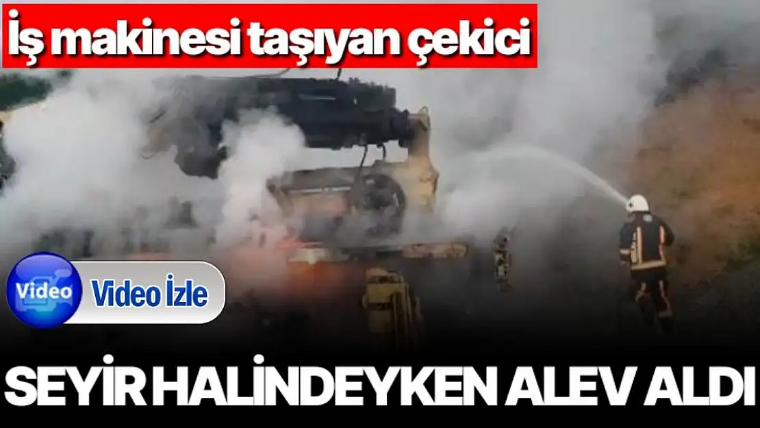 İş makinesi taşıyan çekici seyir halindeyken alev aldı