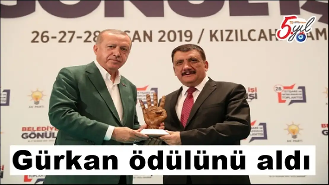 Gürkan ödülünü aldı