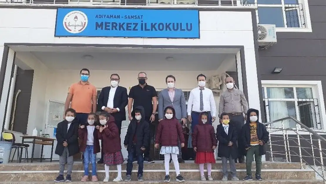 'Öğrencilere ayakkabı ve mont hediye edildi'