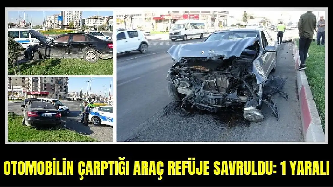 Otomobilin çarptığı araç refüje savruldu