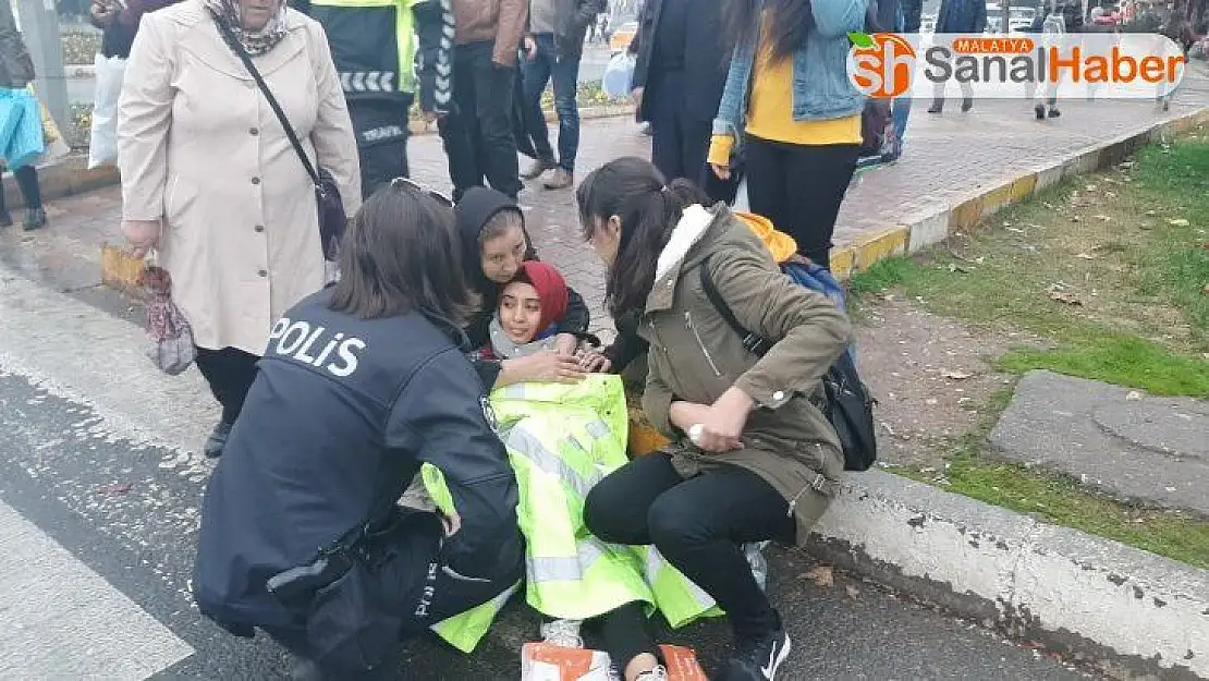 Polis memuru yerde yatan yaralıyı montuyla ısıttı