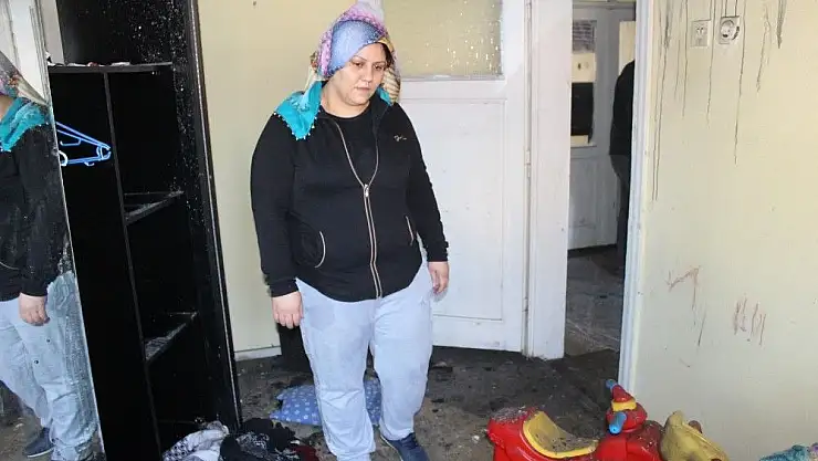 'Evi yanan kadın 2 çocuğuyla yardım bekliyor'