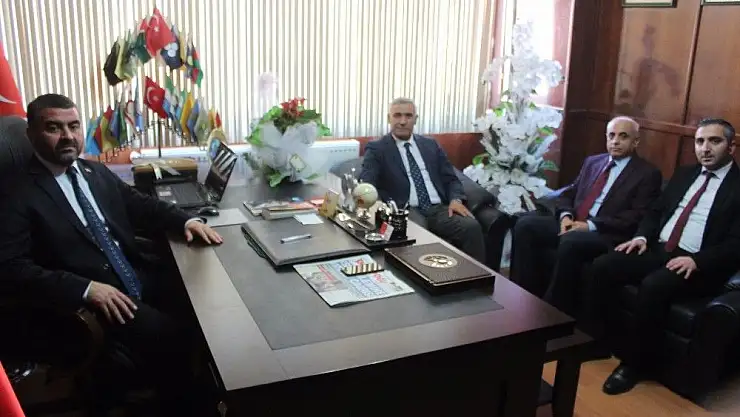 Ak Parti´den MHP´ye ziyaret