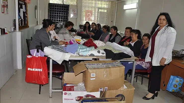 'Halk Eğitim Kursuna nakış ve kumaş desteği'