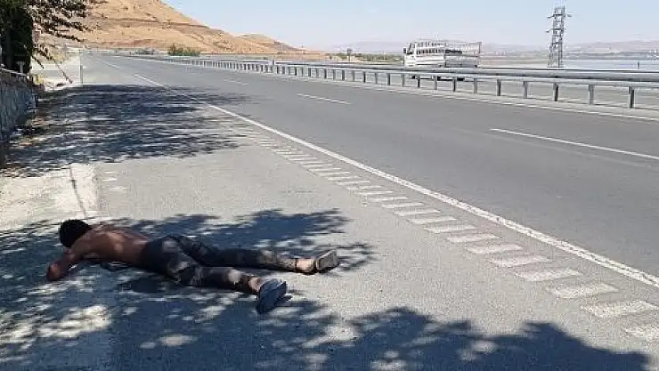 'Anayol kenarında baygınlık geçiren göçmenin imdadında vatandaşlar yetişti'