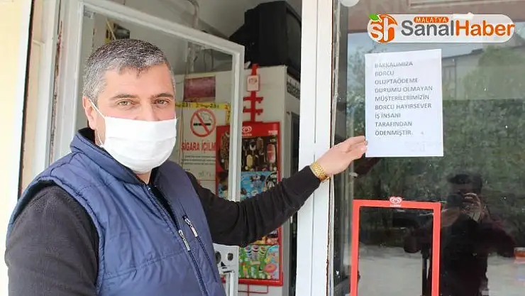 Gizli hayırsever bakkala girdi, 10 bin TL'lik borcu kapattı