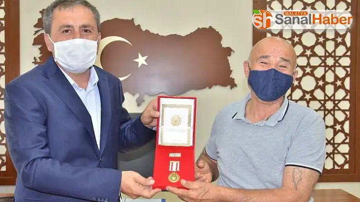 Kıbrıs gazisine madalya ve beratı takdim edildi