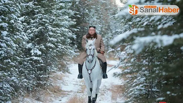 Kim'den dünyaya dağın zirvesinde mesaj