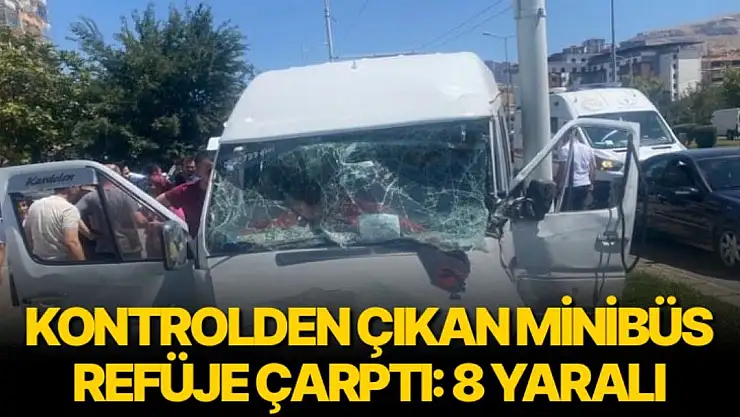 Kontrolden çıkan minibüs refüje çarptı