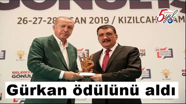 Gürkan ödülünü aldı