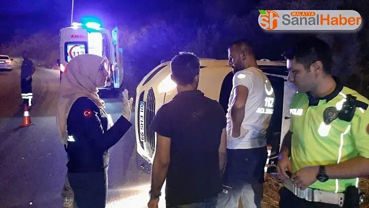 Takla atan otomobilden yara almadan kurtuldu